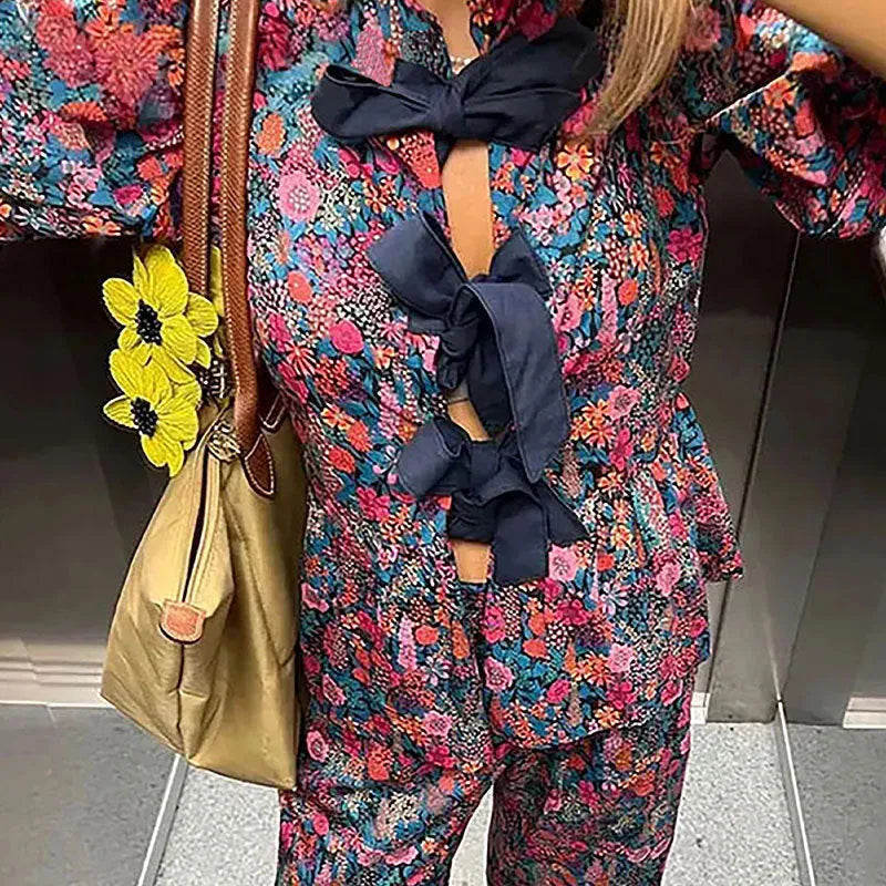 Floral print tie-neck leisure suit with puff sleeves and matching trousers for commuting wear