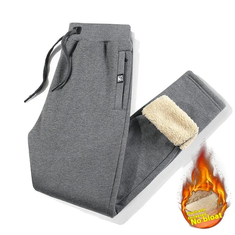 Men's black and grey fleece-lined cotton track pants with mid waist design