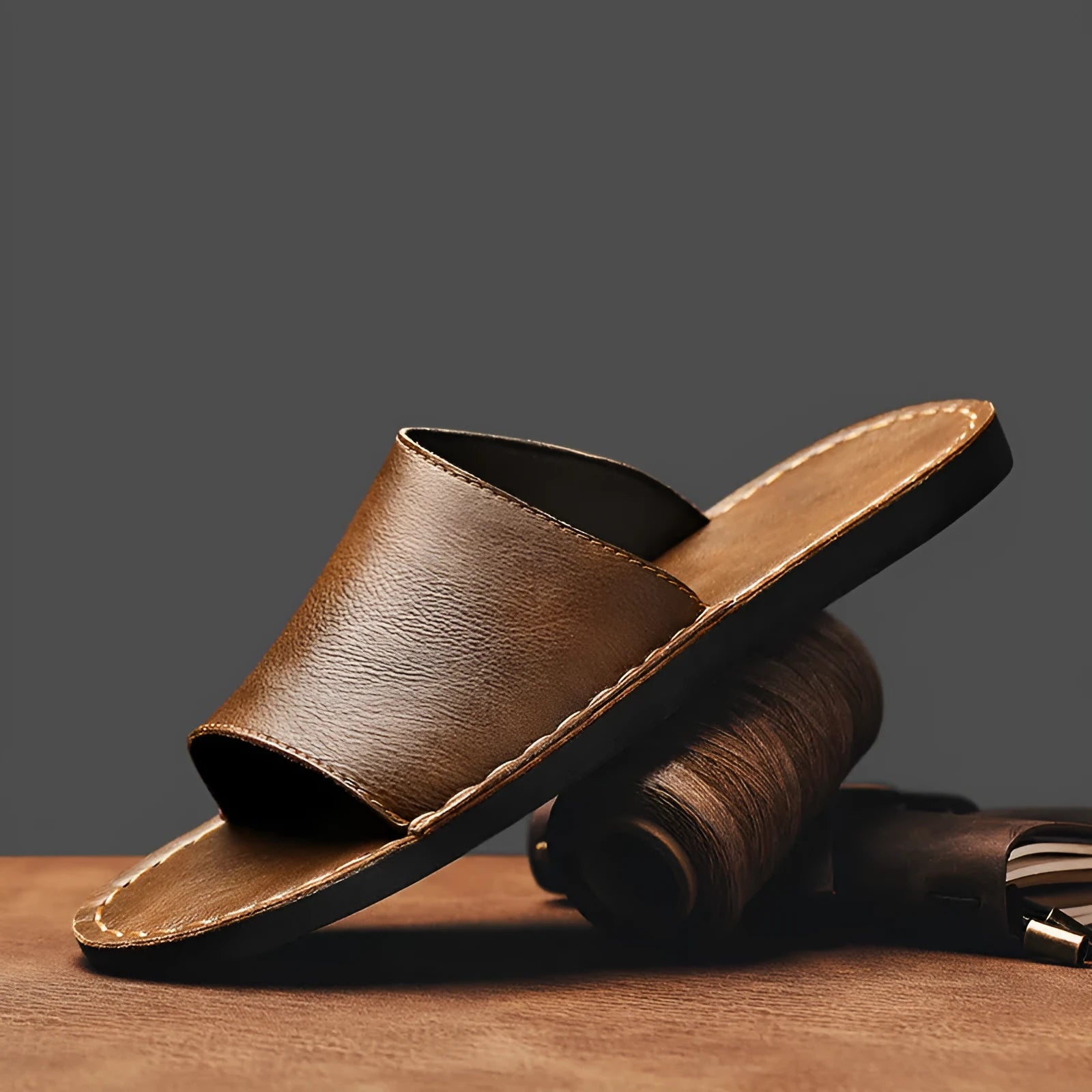 Men's brown leather outdoor sandals with rubber soles shown from side perspective
