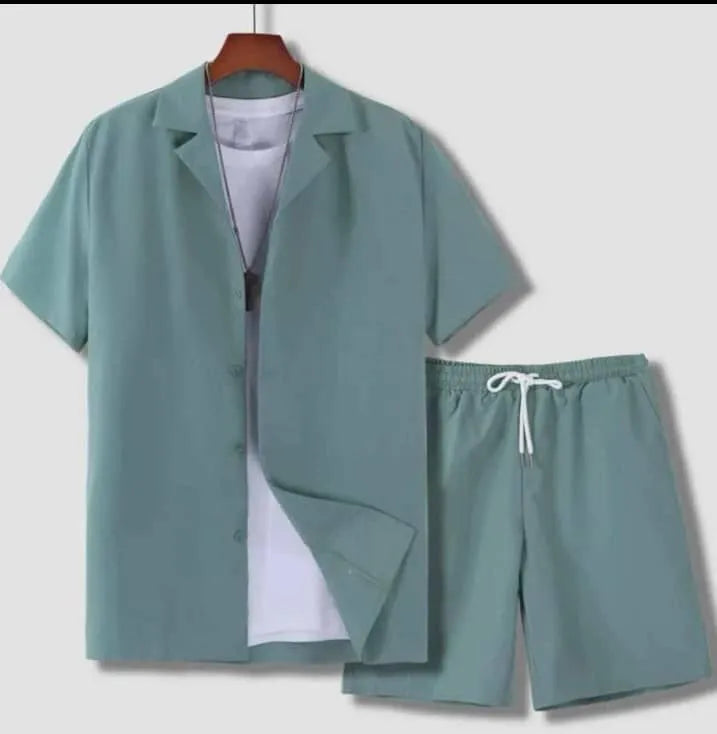 Men's white short sleeve Cuban collar sport shirt and matching shorts laid flat.