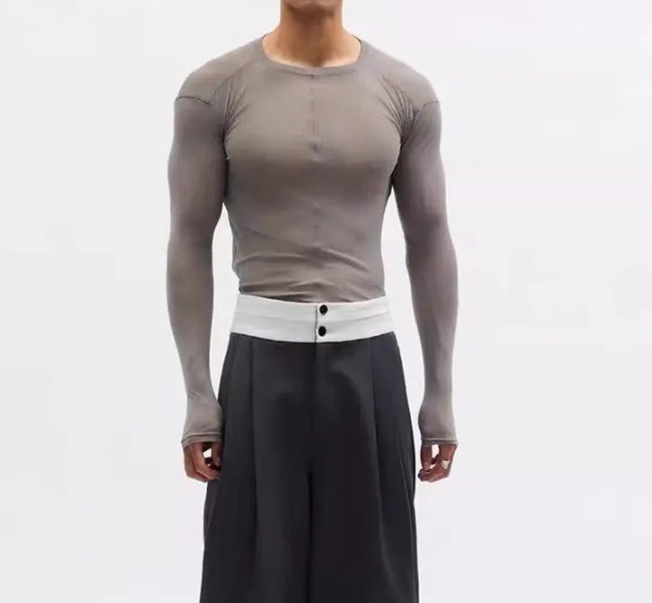 Black women's slim-fit pullover with mesh see-through texture and long sleeves.