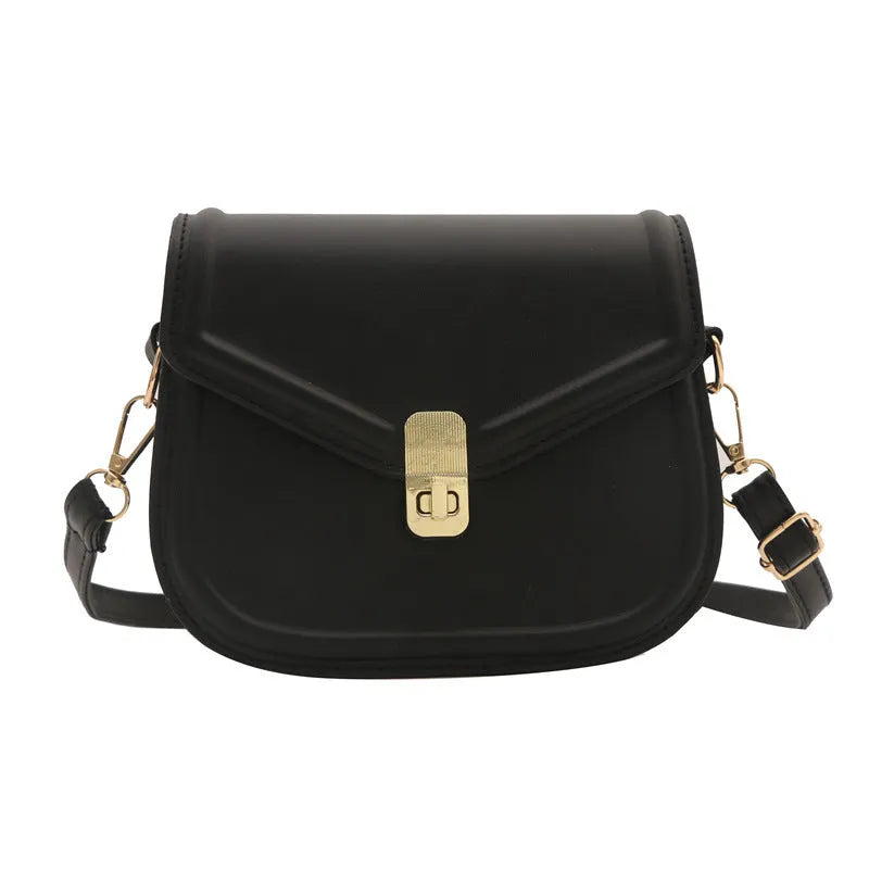 Soft PU leather horizontal square messenger bag with clamshell opening in khaki colour.