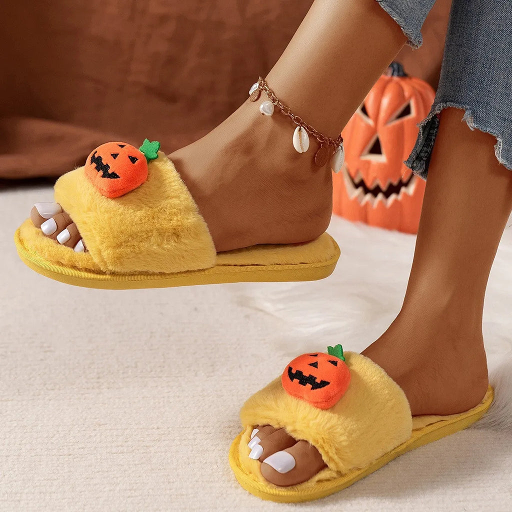 White and yellow Halloween pumpkin plush open toe slippers on anti-slip PVC sole.