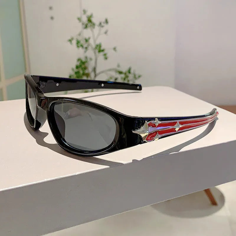 A pair of outdoor sports sunglasses with a PC frame and lens, shown in a black frame with grey lens colour variant.
