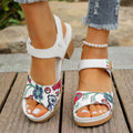 White women's casual high heel sandals with a prominent Velcro strap buckle closure.