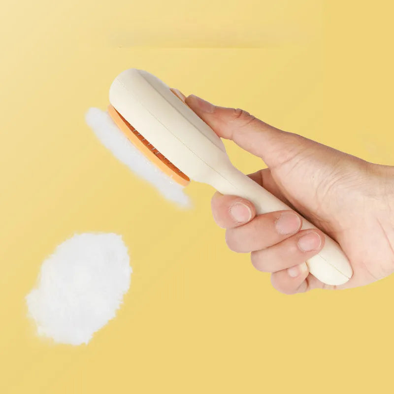 Green and yellow cat grooming brush with stainless steel comb and non-slip silicone handle.