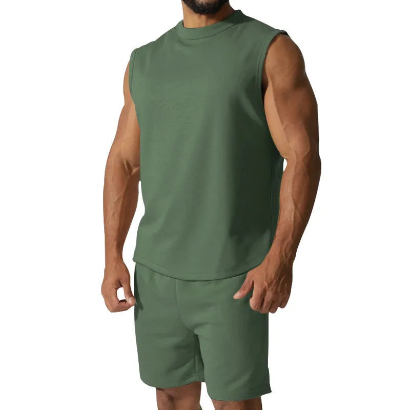Men's solid colour sleeveless sports top and matching casual shorts set on a hanger