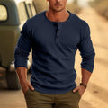 Men's white Henry collar long-sleeved cotton blend t-shirt showing front view with size label