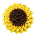 Yellow sunflower-shaped dog snuffle mat with rope and buckle for slow feeding and nosework training