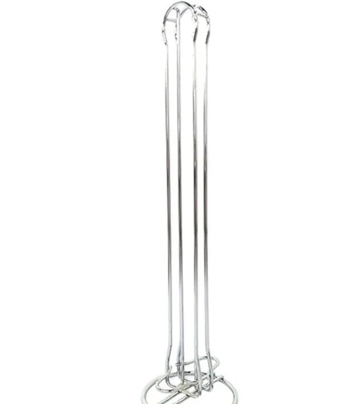 Black wrought iron coffee capsule rack holding 20 pods on display shelves.