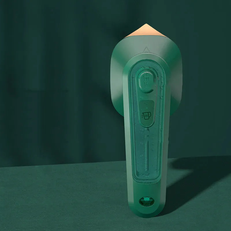 Handheld portable garment steamer in dark green with large titanium soleplate