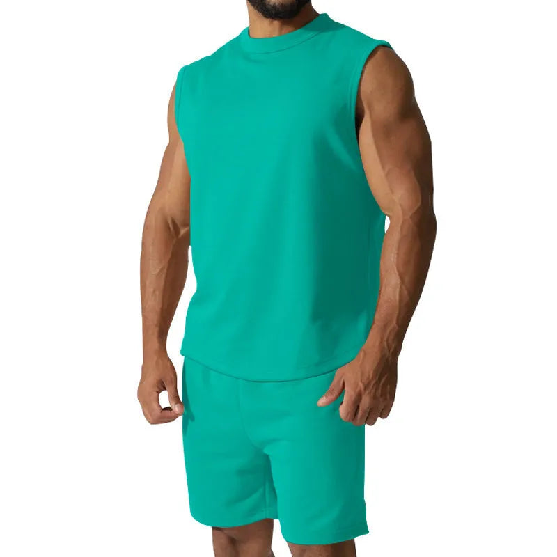 Men's solid colour sleeveless sports top and matching casual shorts set on a hanger