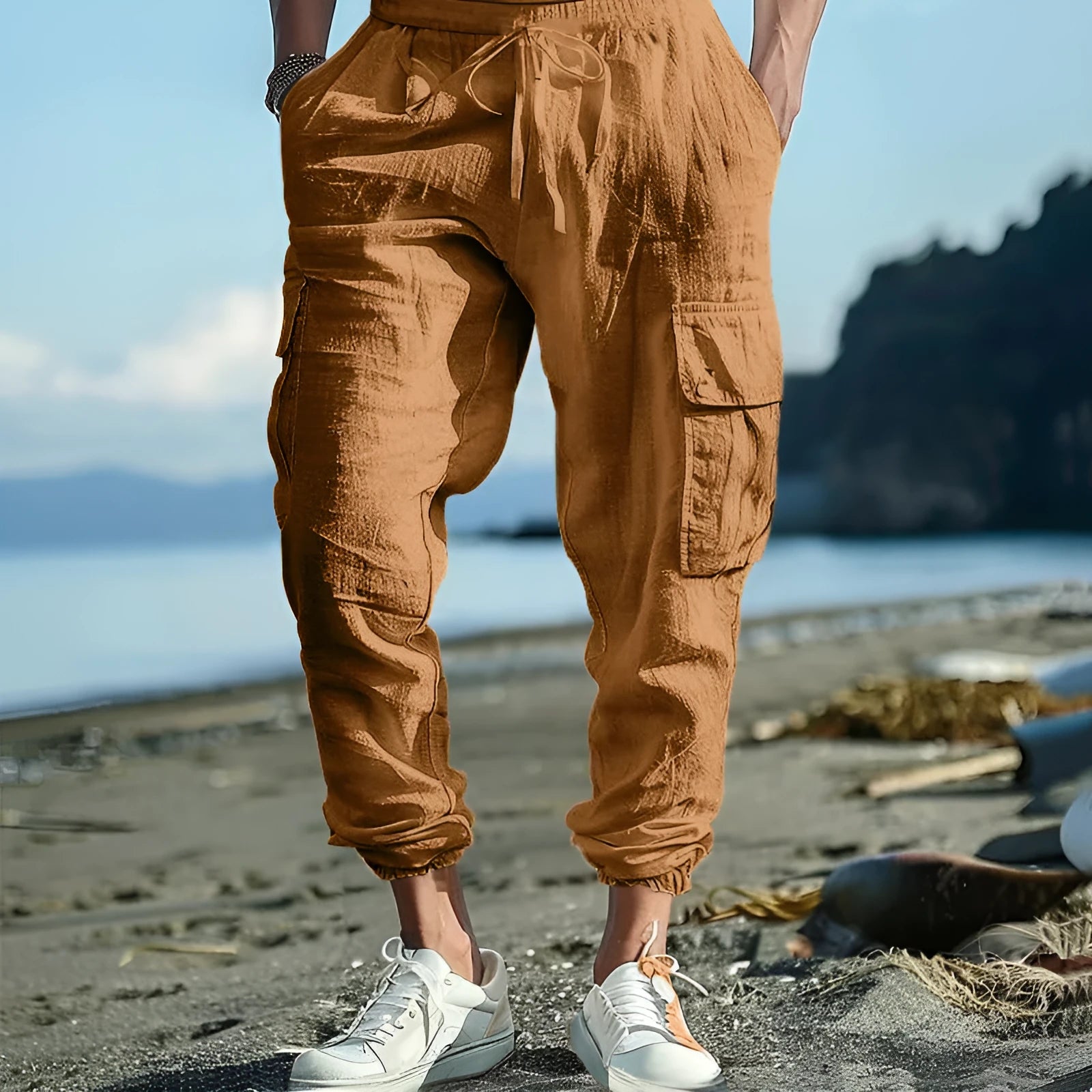 Men's linen casual trousers with ankle-tied design and multiple pockets in army green colour.