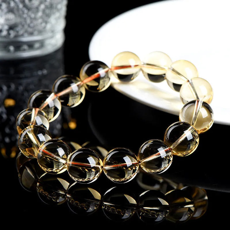 Natural citrine scattered beads ball bracelet showing polished 7A and 6A grade stones in various sizes