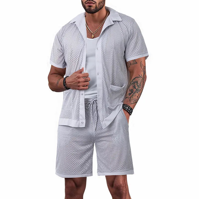 Lake blue see-through beach dress with matching cardigan and shorts set on a model.