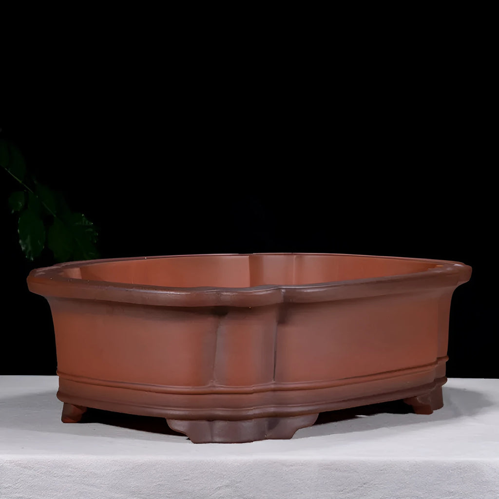 Large antique-style rectangular purple clay flower pot with Chinese design elements.