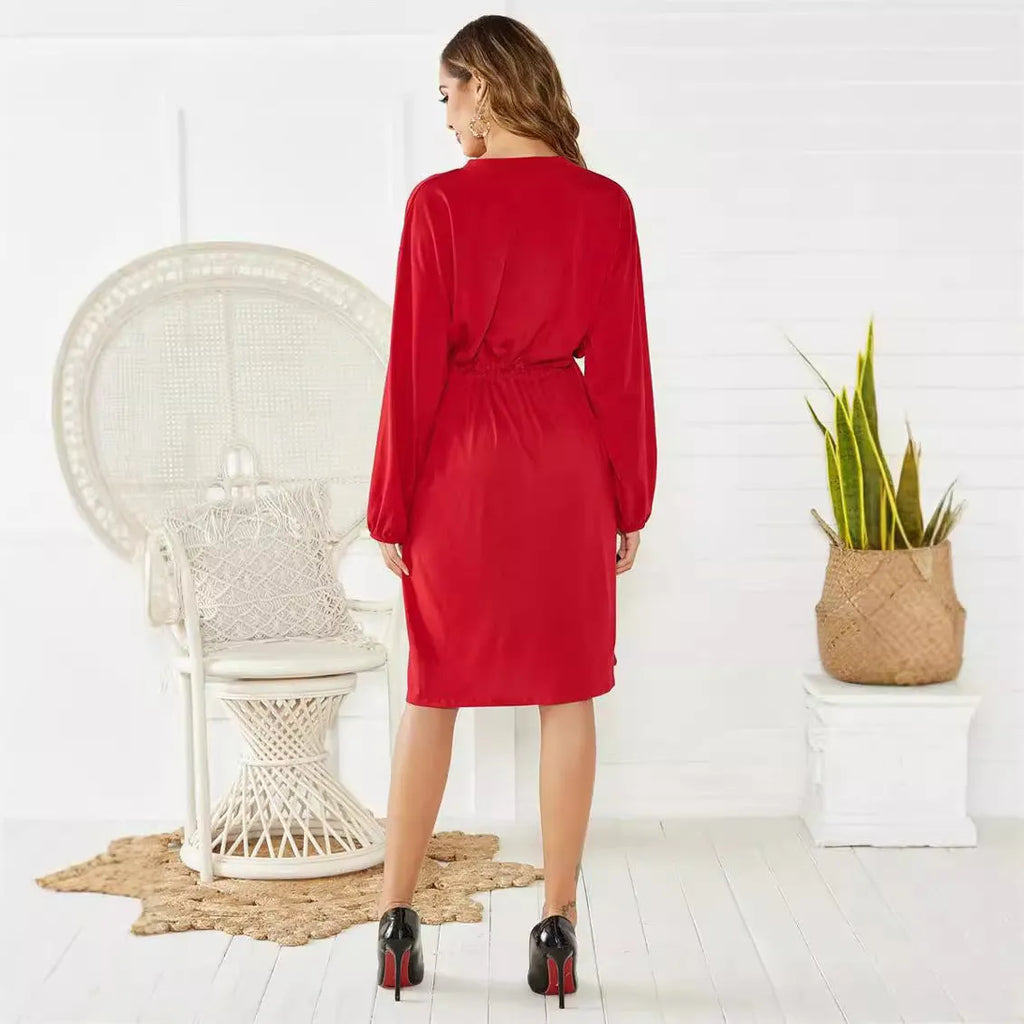 Women's black polyester dress with elastic waist, self-tie belt, and elastic cuffs on long sleeves