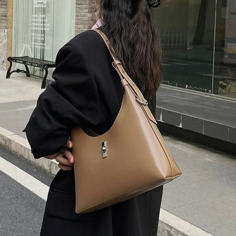 Genuine leather crossbody shoulder bag in dumpling shape with external sandwich pocket