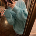 Loose fit women's pullover sweater in solid lake blue colour with regular sleeves