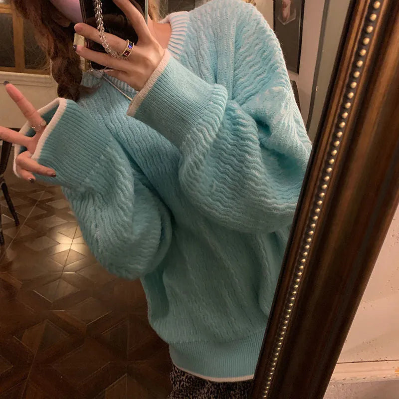 Loose fit women's pullover sweater in solid lake blue colour with regular sleeves