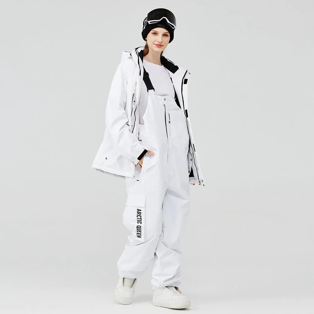 Men's and women's waterproof winter ski suit in blue top with grey blue trousers.