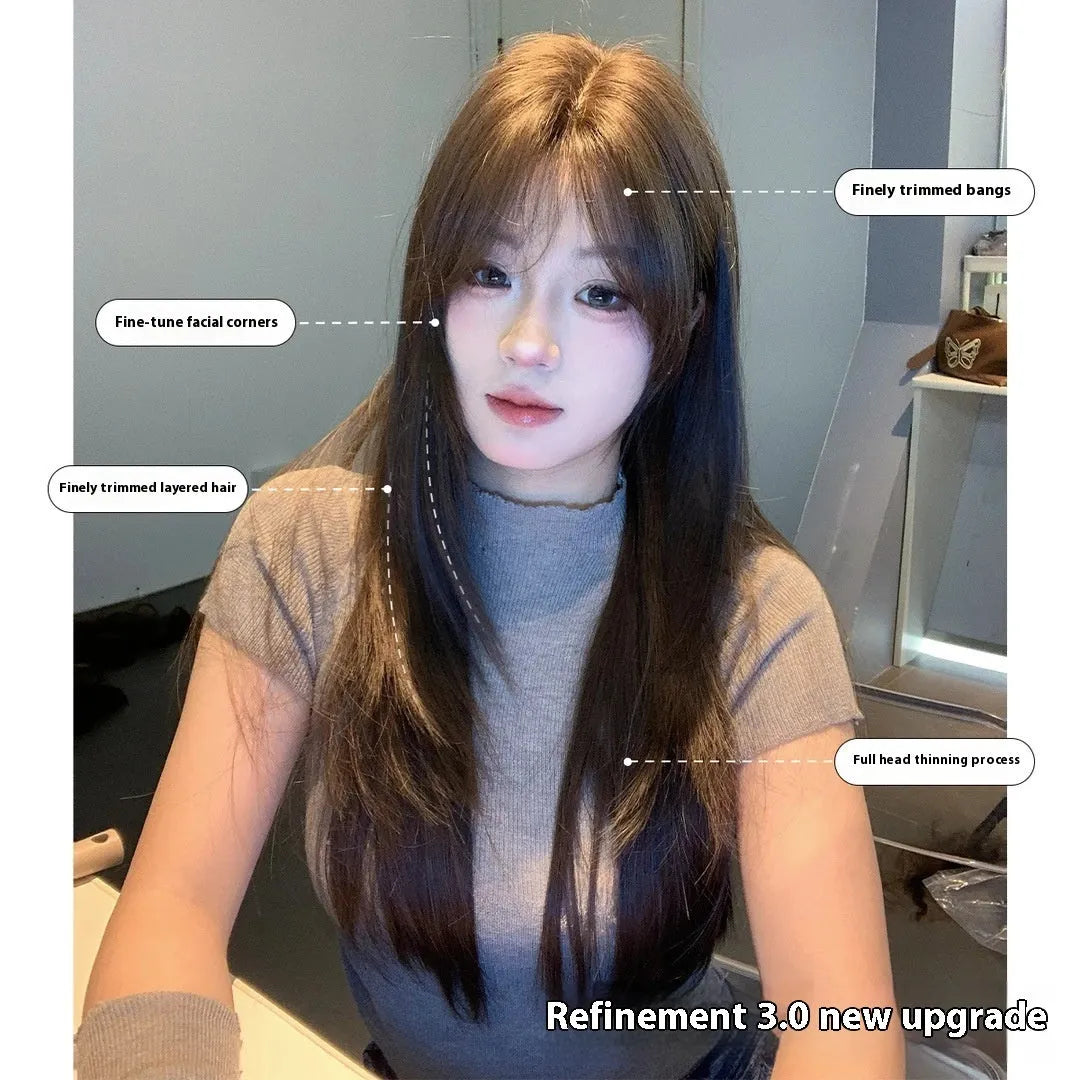 Cold brown long straight layered wig on a stand showing lace front.