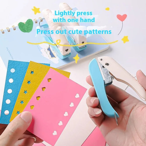 Small manual punching machine for creating love heart, star, and round embossed paper shapes.