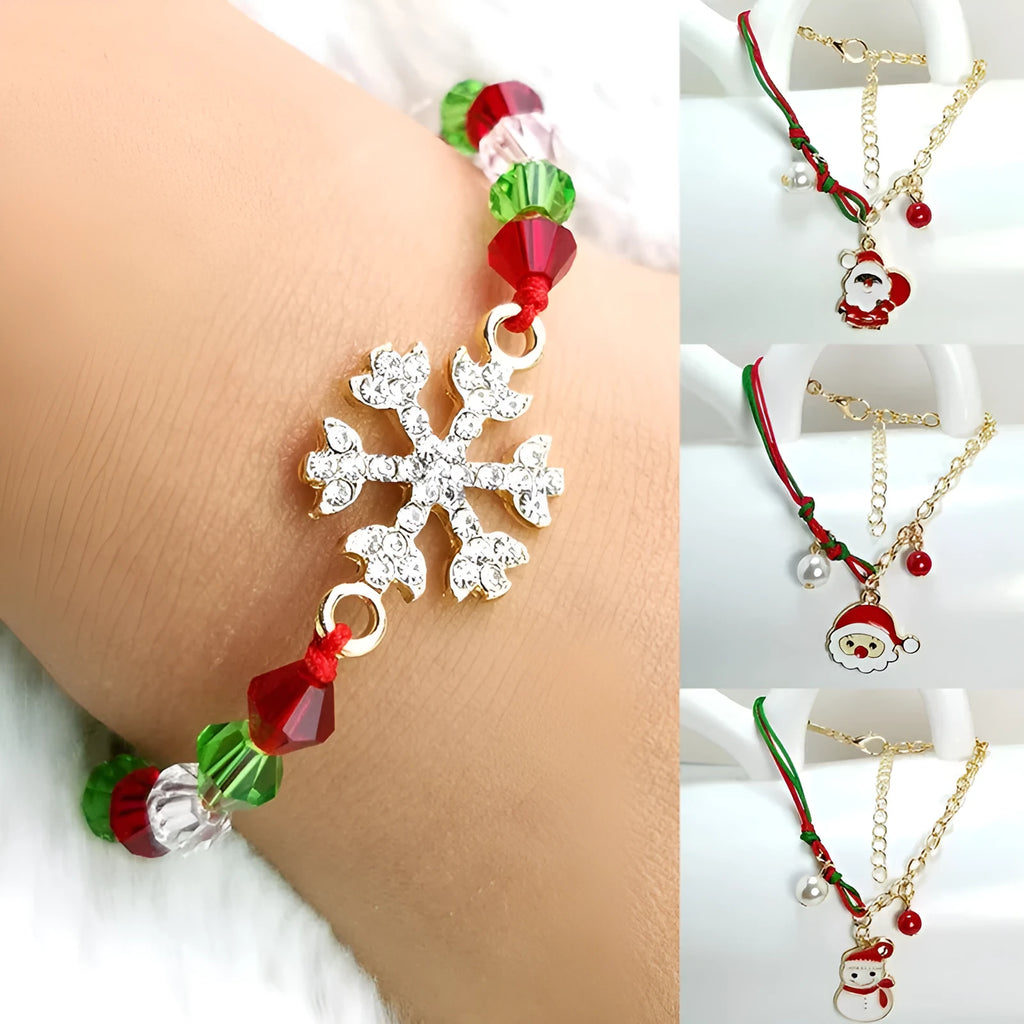 Christmas charm bracelet with alloy chain and festive pendant charms on light background