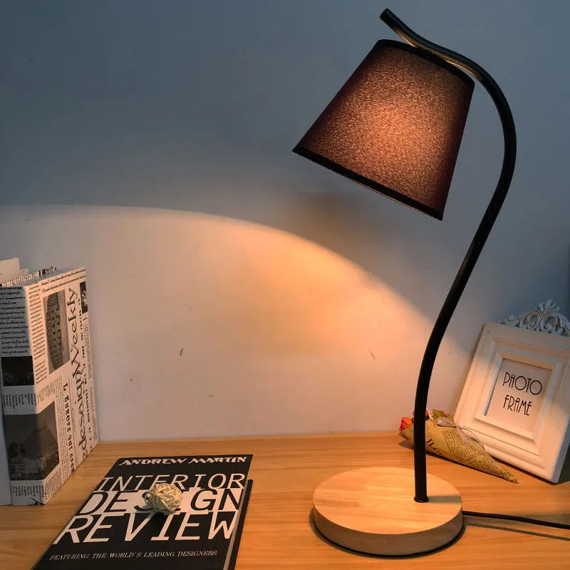 Nordic style desk lamp with dimmer switch in white finish on wooden desk