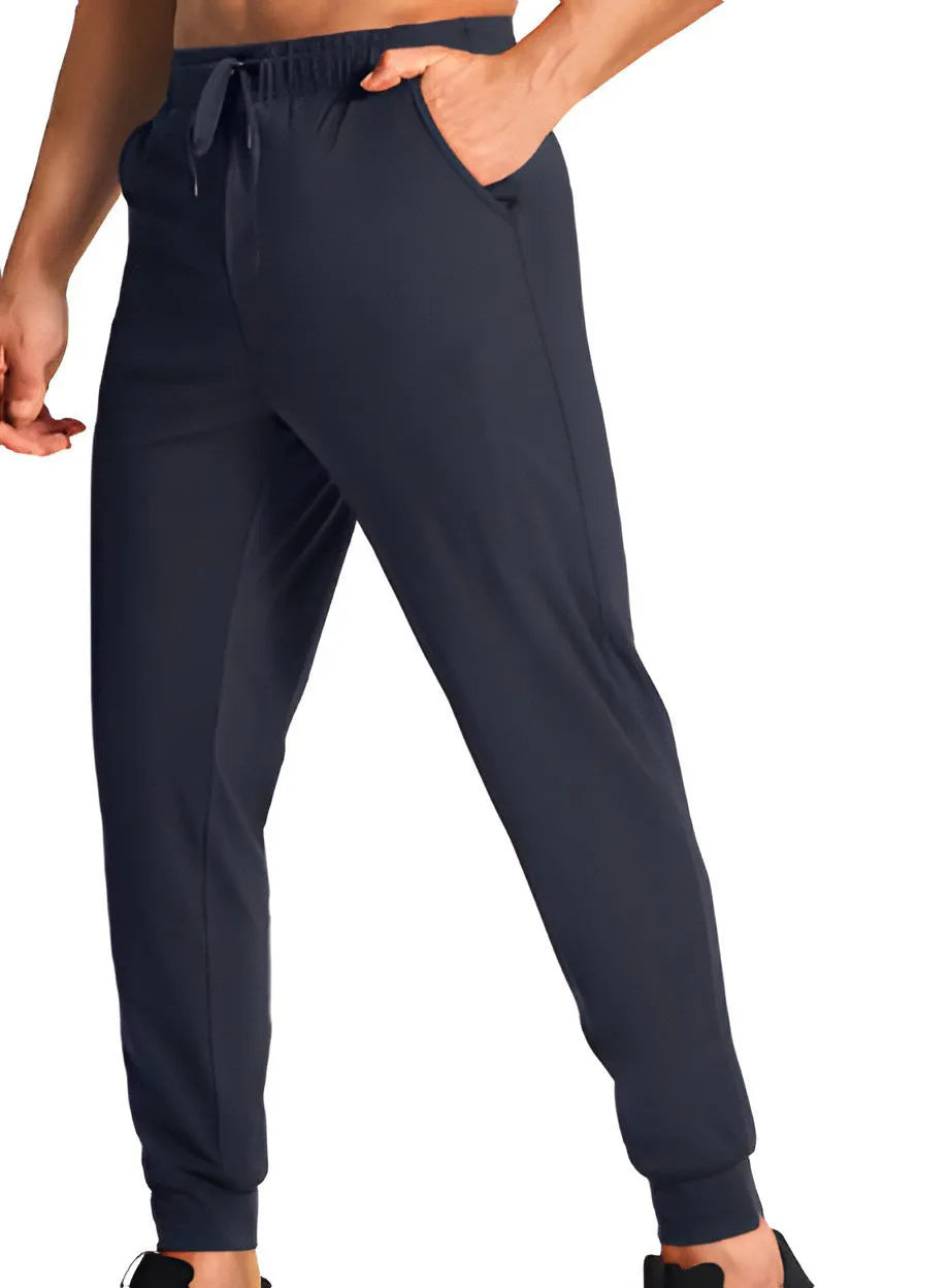 Men's loose fit casual trousers in solid colours with polyester fabric construction