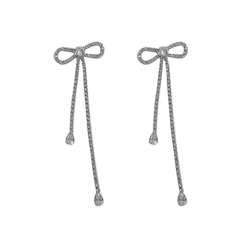 Fashion jewellery silver needle long bow tie full-jeweled stud earrings for women in gold and silver drop shape