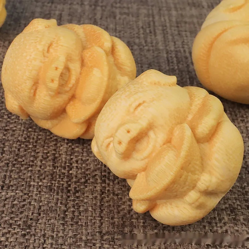 Solid bamboo carving ornament with cute pig ingot design measuring 4cm in height