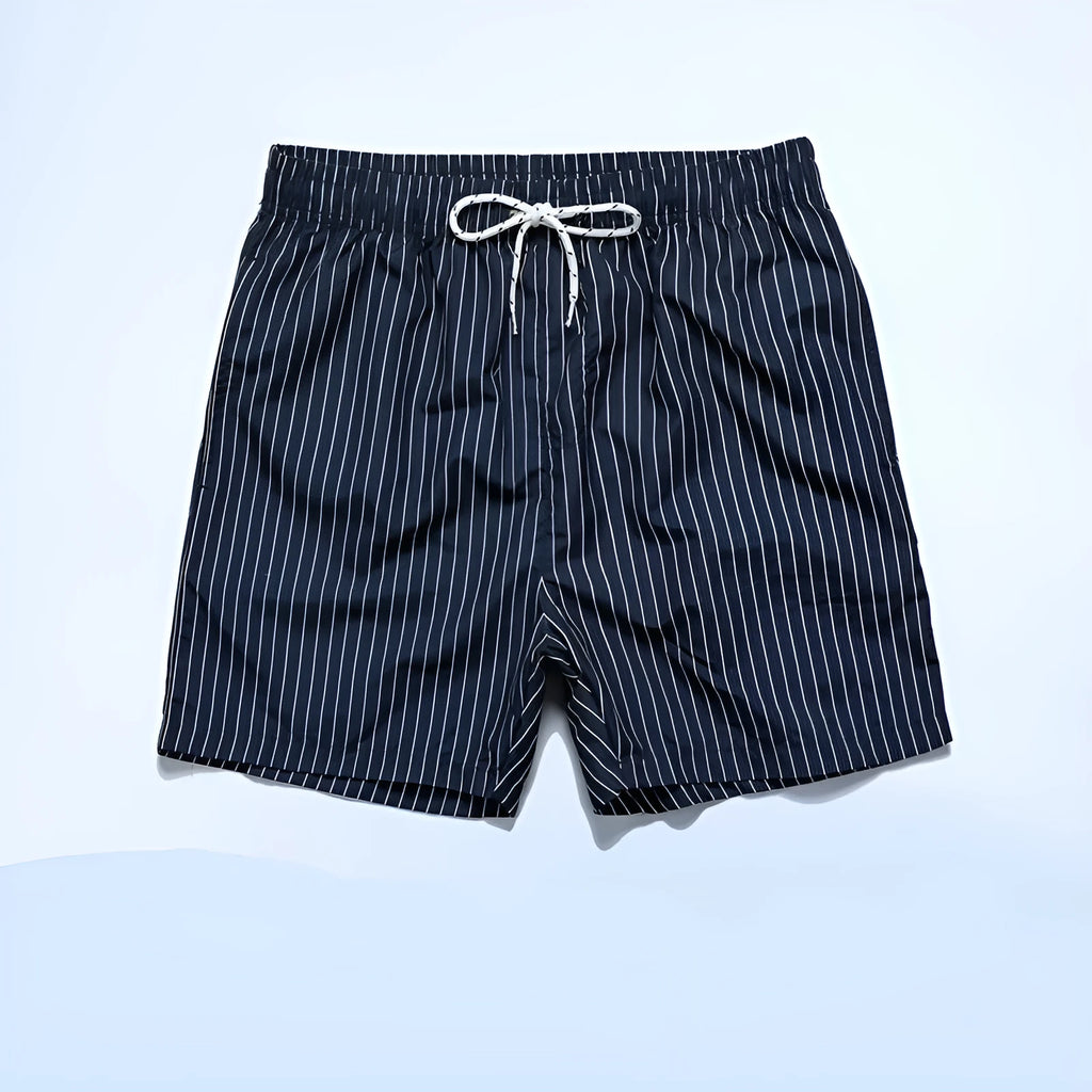 Polyester fibre beach shorts with digital printed striped triangle lining in straight leg style