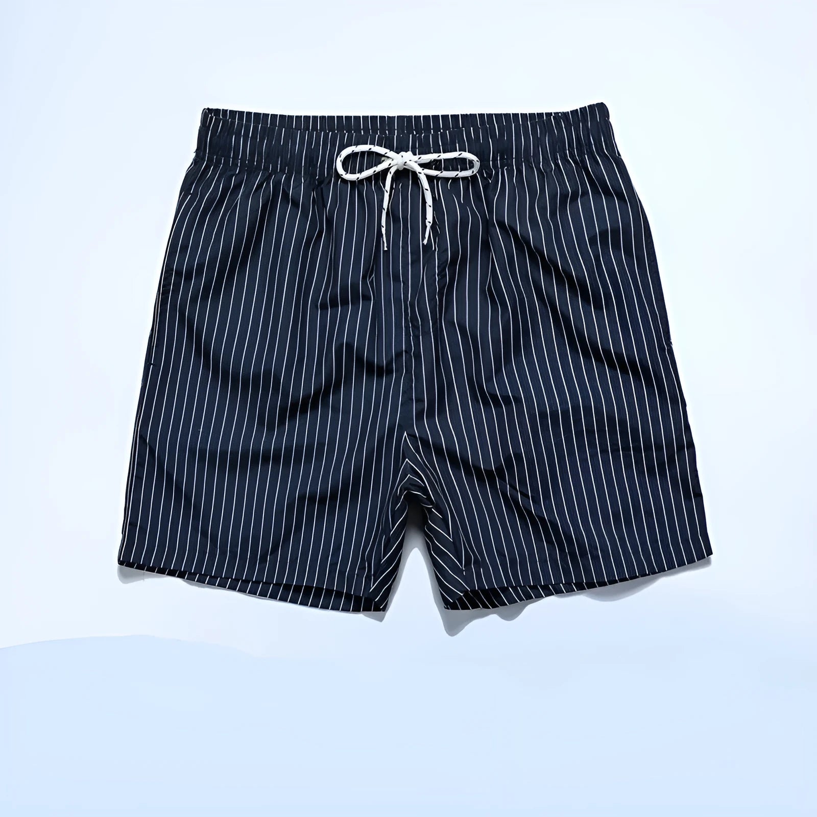Polyester fibre beach shorts with digital printed striped triangle lining in straight leg style