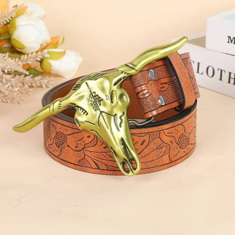 Men's black imitation leather belt with a metallic alloy cow head buckle and pin buckle fastening
