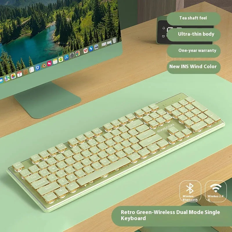 Prewalker V3 retro green coloured quiet keyboard and mouse set on a desk