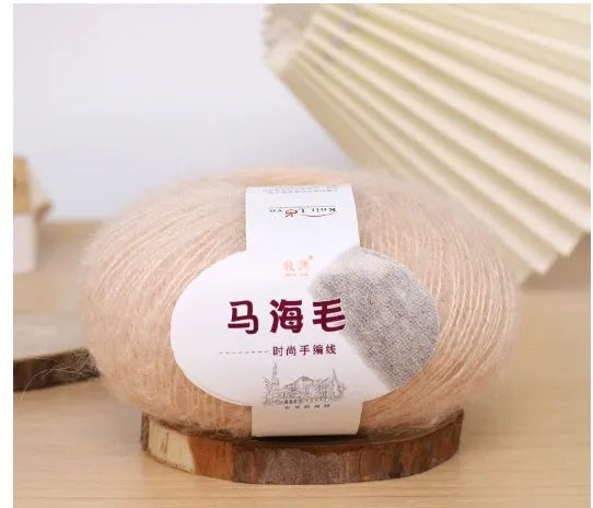 Mohair wool ball for DIY scarf knitting in assorted colours on white background