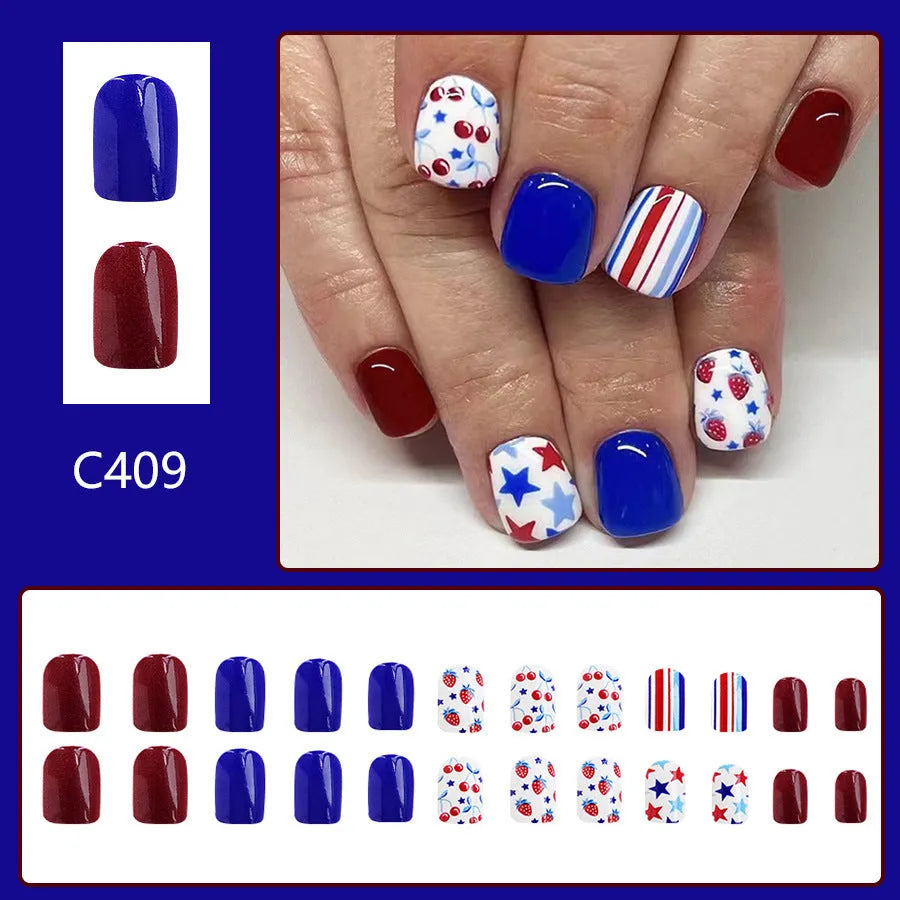 Short glossy false nail stickers with red and blue strawberry cherry design for Independence Day