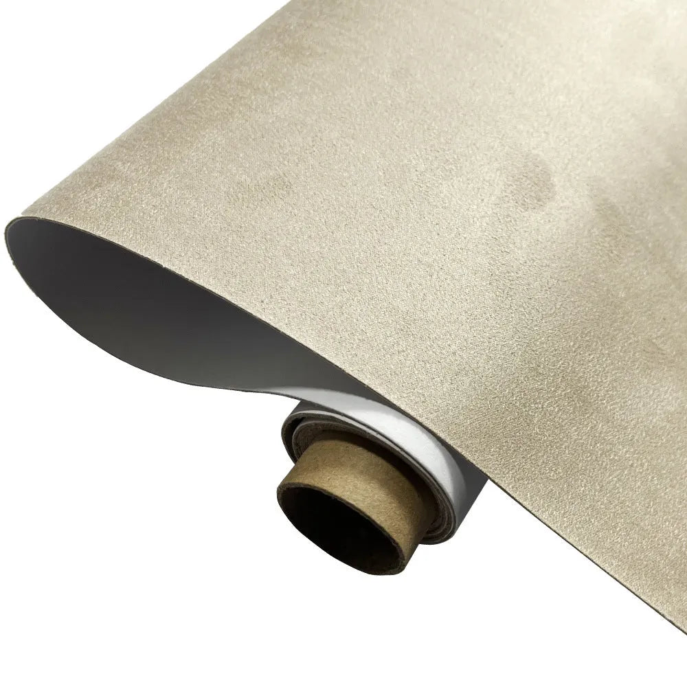 A sheet of self-adhesive black leather suede material with a ruler showing its 0.5mm thickness.