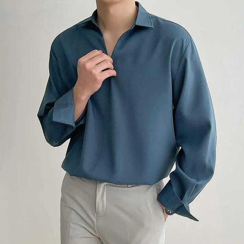 Men's loose lapel casual long sleeve shirt in solid colours on a hanger
