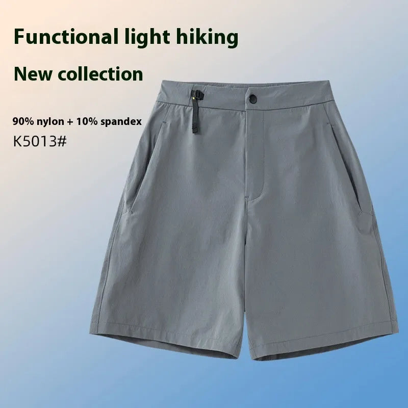 Men's solid colour quick-dry sports shorts with elastic waistband, shown in khaki.