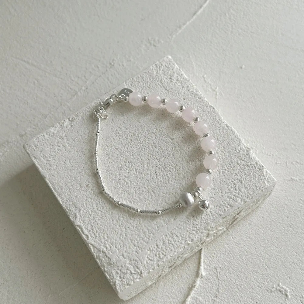 925 silver brushed ball bracelet with silver pink crystal electroplated finish on white background