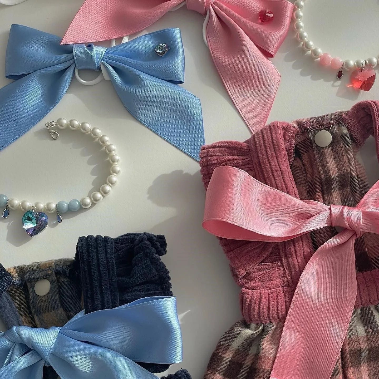 Princess style dog hair band with adjustable bow on canine model showing jacquard fabric detail