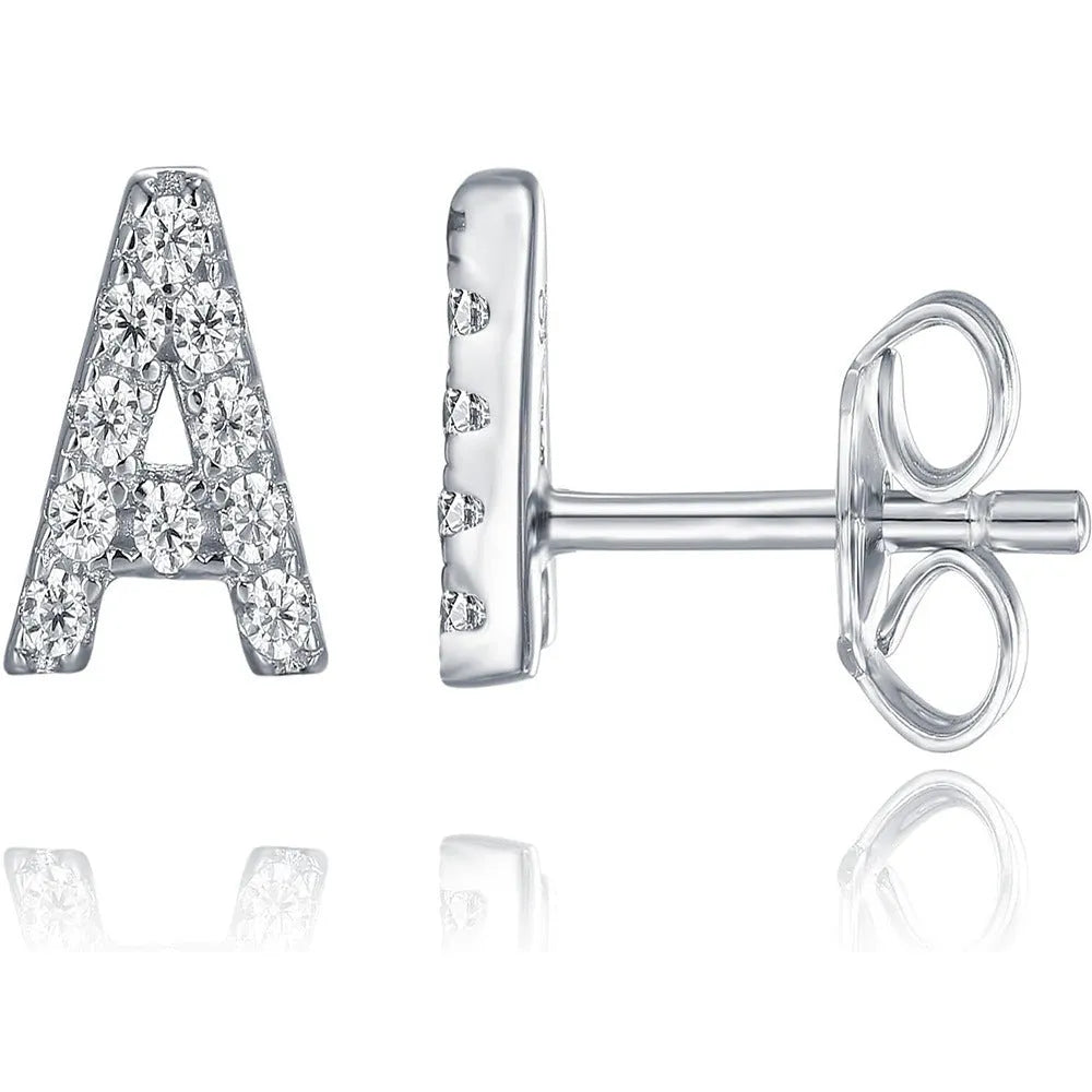 Brass gold plated alphabet earrings showing zircon letter detailing on copper base with gold plating