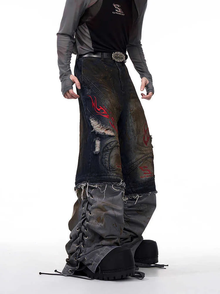 Men's retro jeans with detachable trouser legs showing loose wide-leg fit in picture colour denim