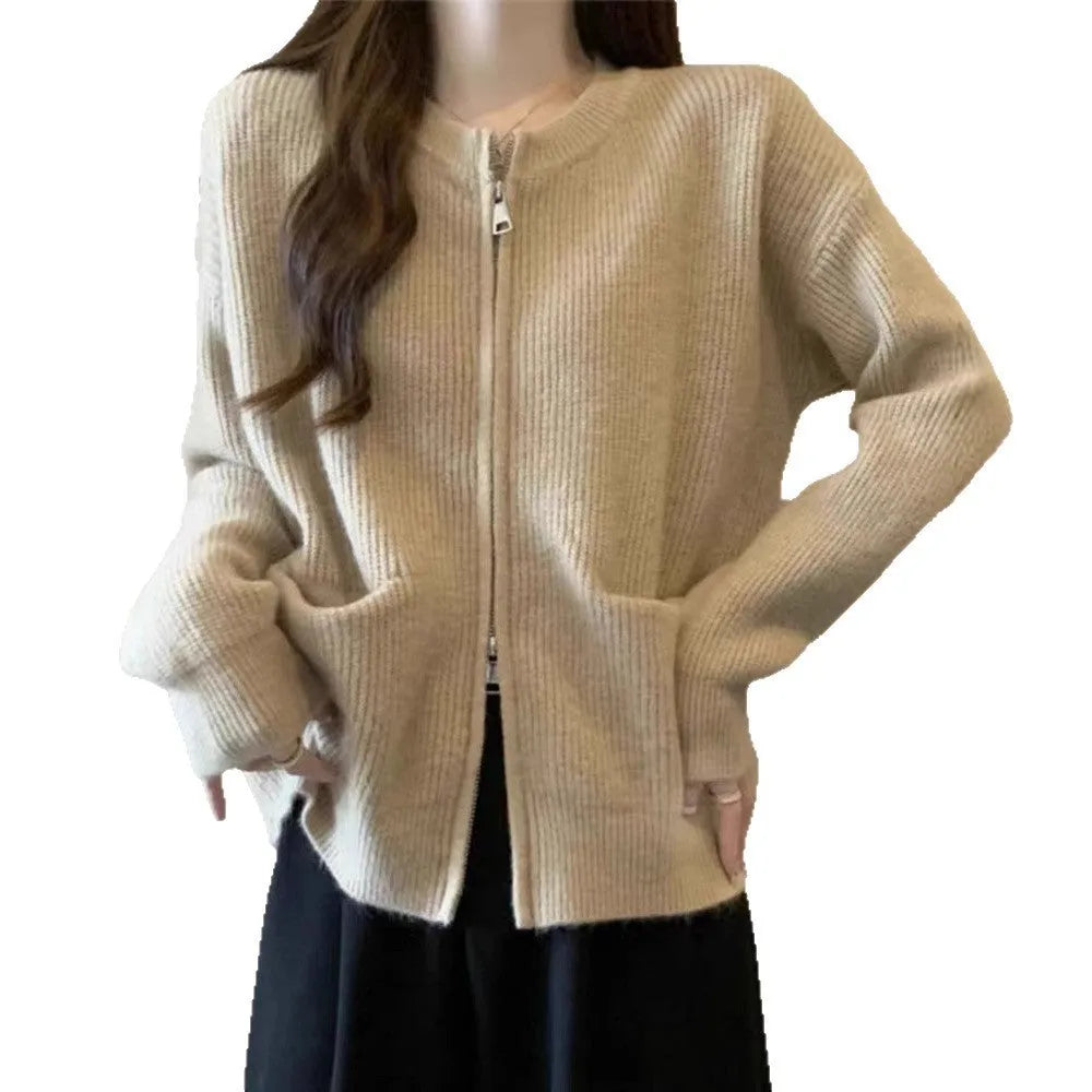 Beige viscose knit long sleeve cardigan sweater coat on a hanger