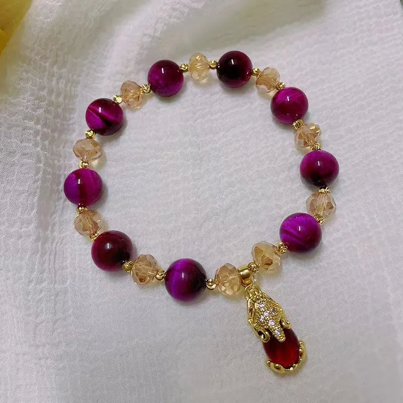 Handmade natural Tigereye stone bracelet with Vanves stone centre, shown in single and double chain designs.