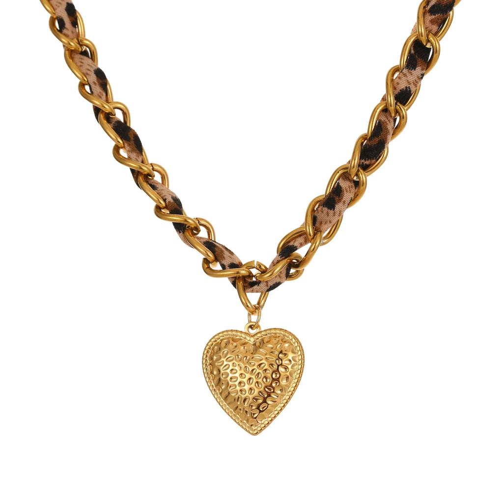 Gold-coloured stainless steel necklace with an adjustable chain and a choice of Big Heart or geometric Love Sun pendant.