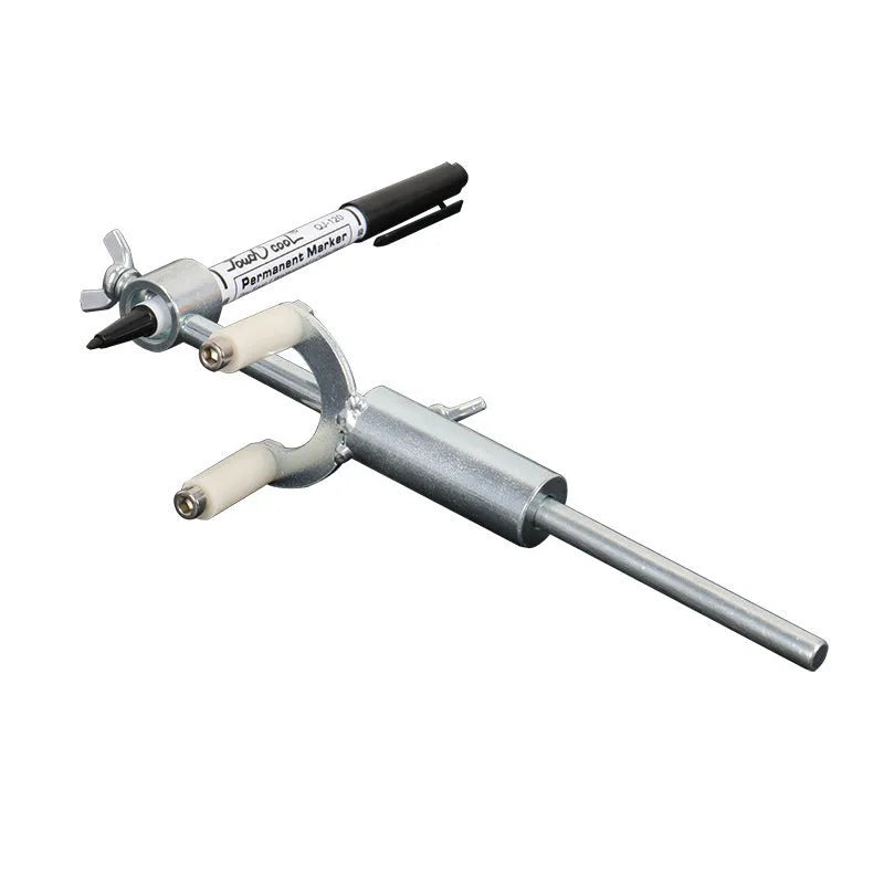 Metal wheel brow scriber depression repair tool on a workbench with a car body panel