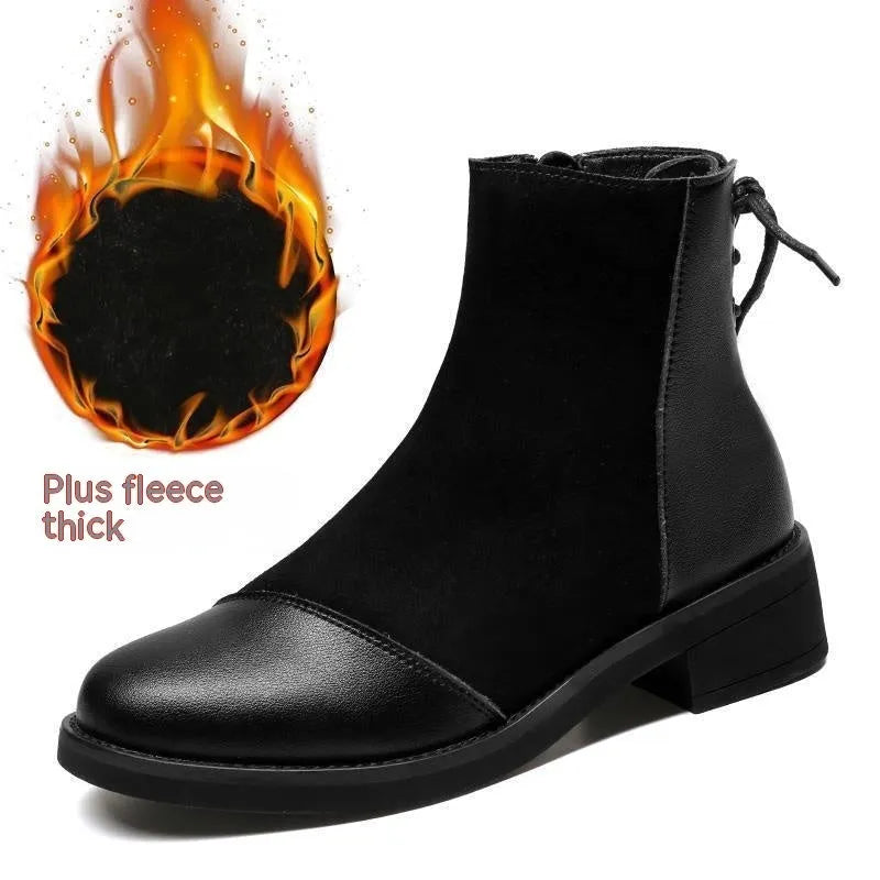 Black women's knee-high martin boots with a side zipper, round toe, and decorative bow.